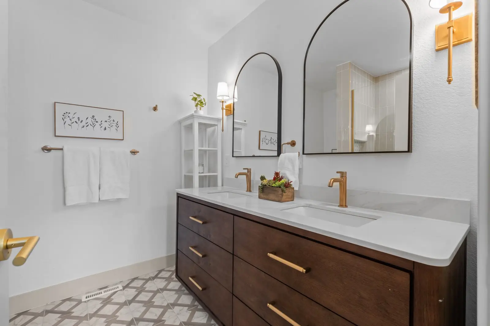 Double vanity bath in a brick Tudor