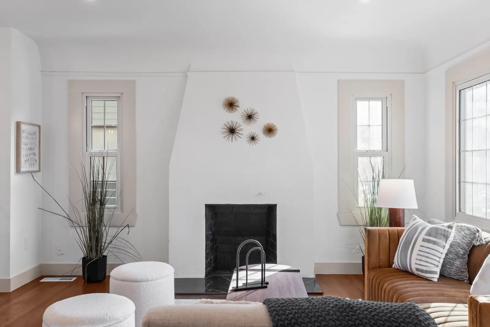 Fireplace in a brick Tudor living room